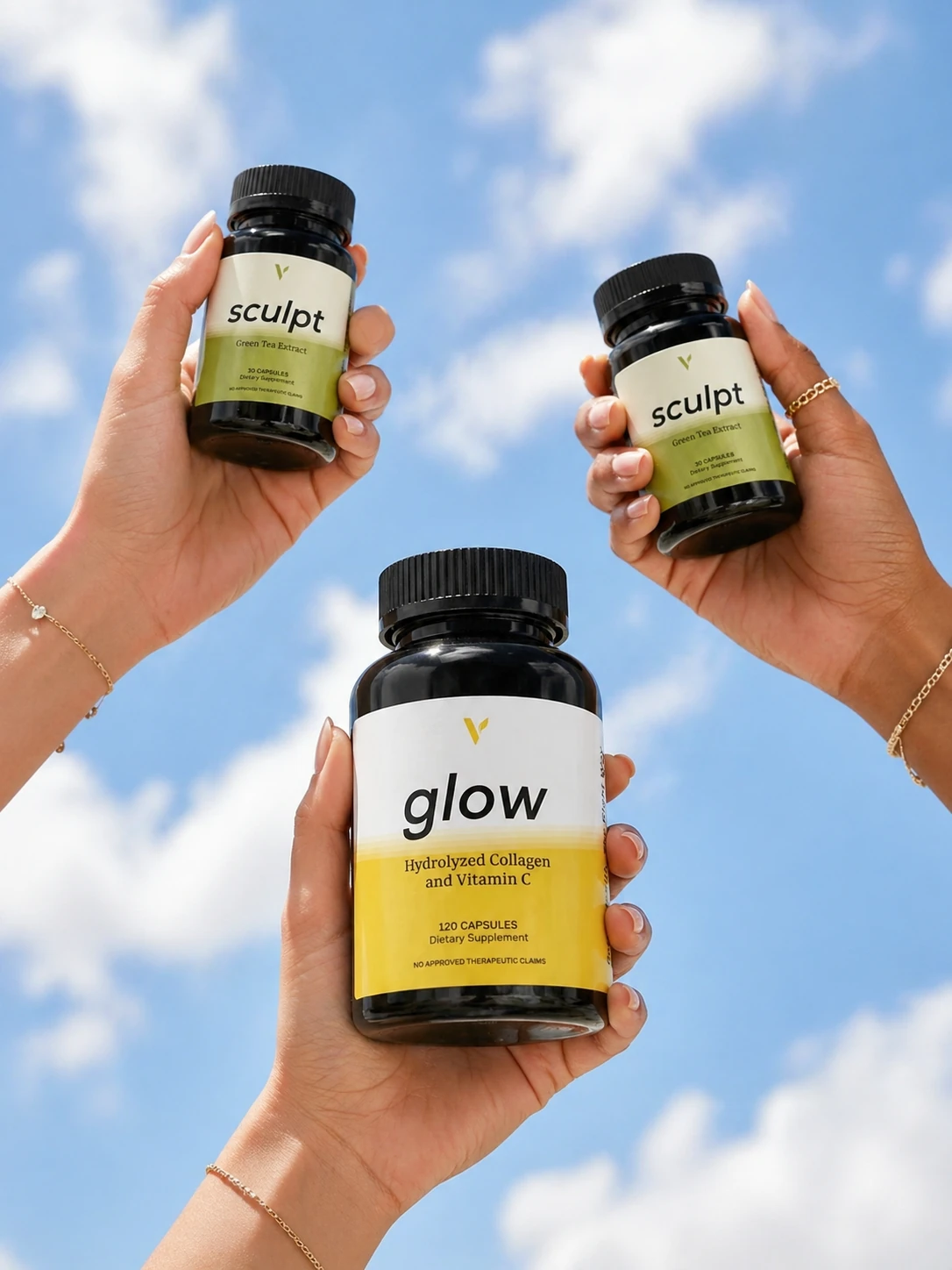 Glow and Sculpt held up against a bright blue sky